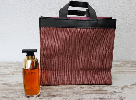 Spellbound Estee Lauder EDP (eau de parfum) 50ml + Toiletry Bag. Discontinued.