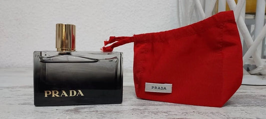 Prada L’Eau Ambrée EDP (Eau de Parfum) 80ml, in its small bag. Discontinued.